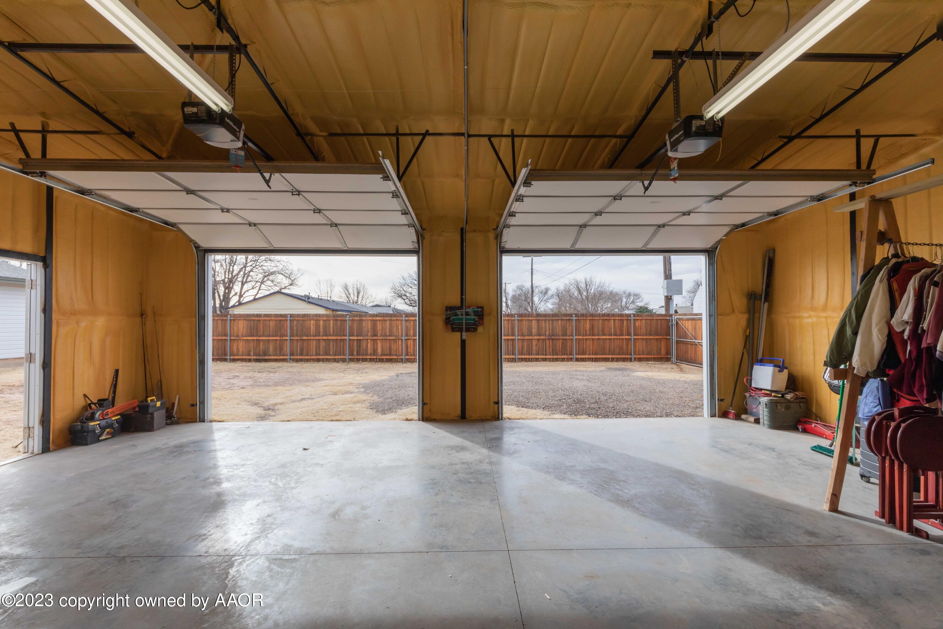 2920 South Nelson Street Amarillo, TX 79103 - Photo 42 of 47 a view of a garage with wooden floor