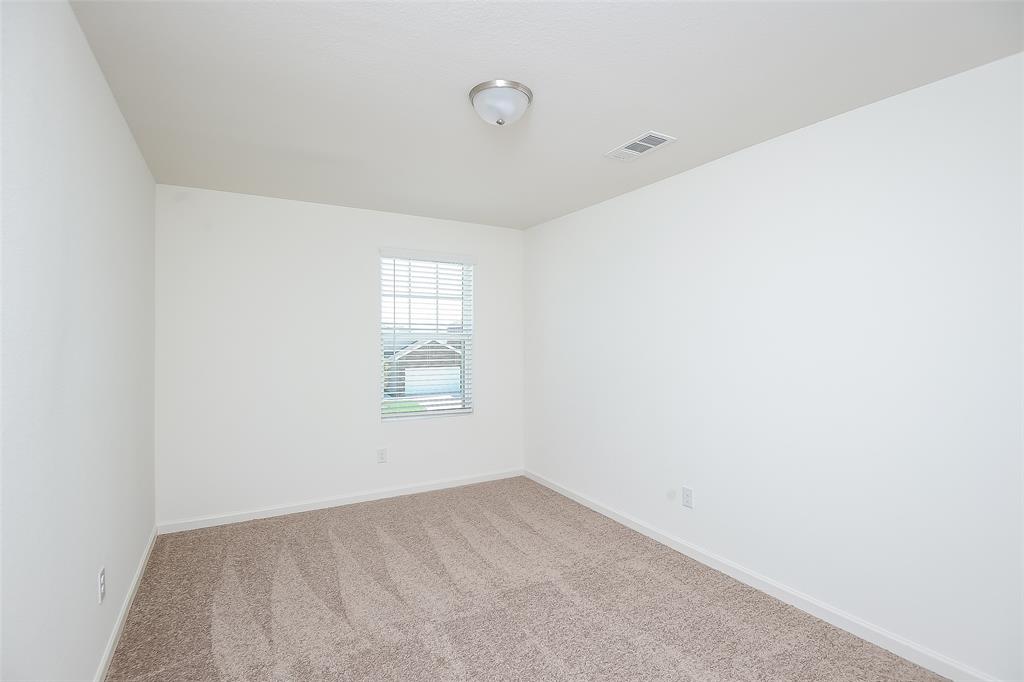 505 Canoe Way Crowley, TX 76036 - Photo 11 of 17 a view of empty room with window