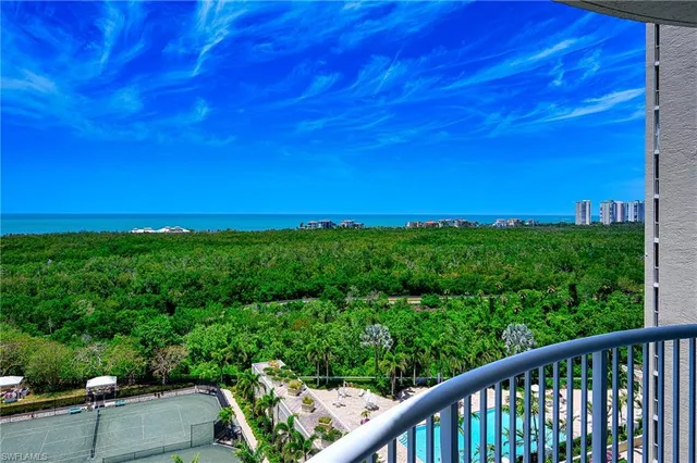 a view of a garden from a balcony