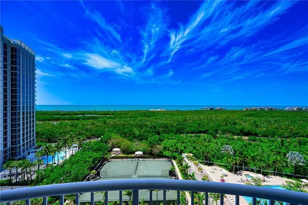 a view of a garden from a balcony
