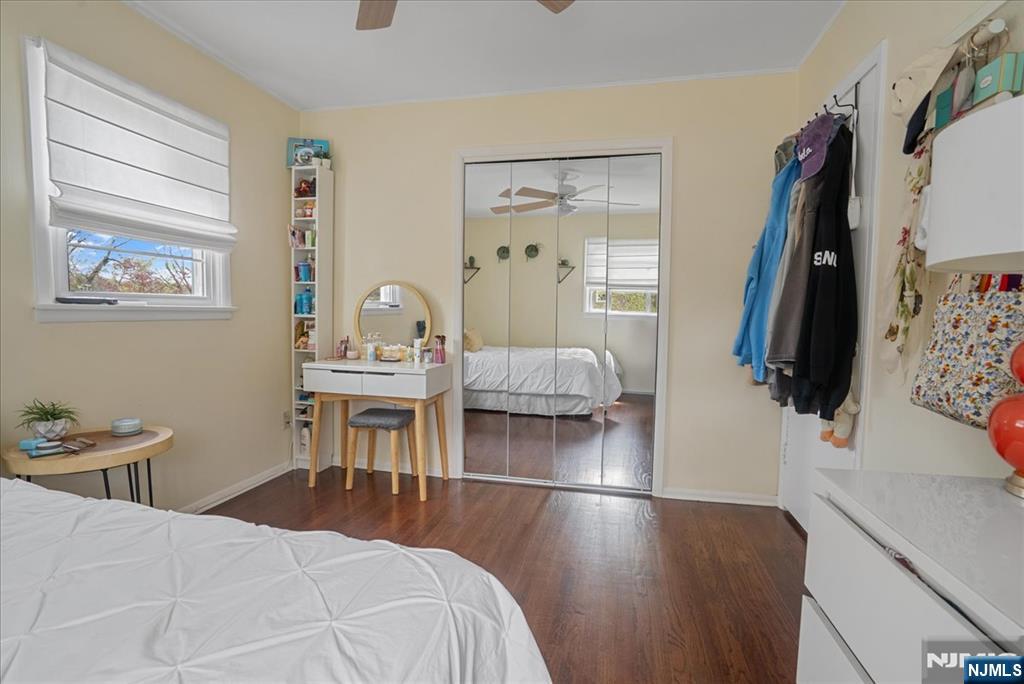 11 Westland Road Verona, NJ 07044 - Photo 16 of 29 a bedroom with a bed and a flat tv screen on the dresser