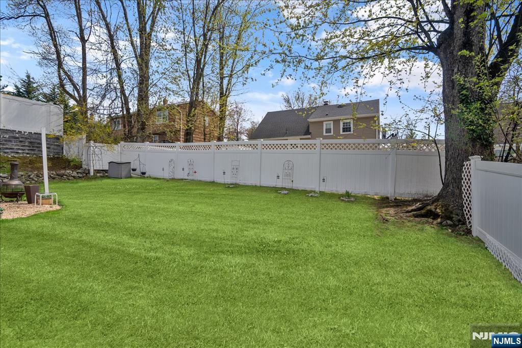 11 Westland Road Verona, NJ 07044 - Photo 26 of 29 a view of a backyard with a small cabin