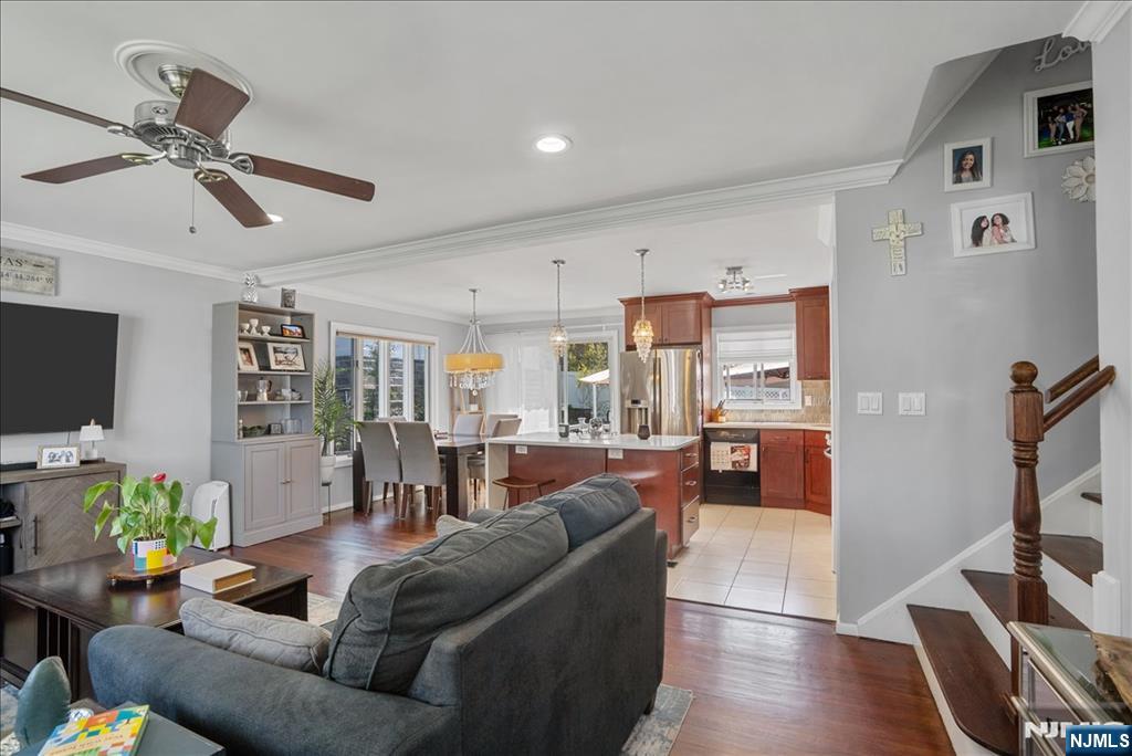 11 Westland Road Verona, NJ 07044 - Photo 4 of 29 a living room with furniture and a flat screen tv