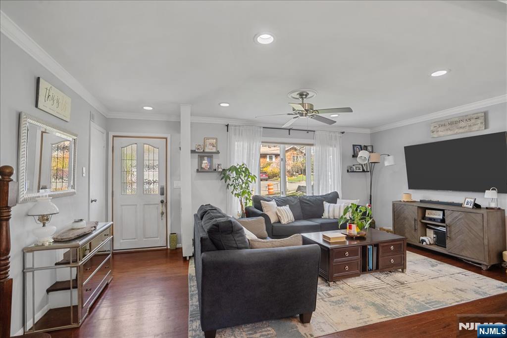 11 Westland Road Verona, NJ 07044 - Photo 6 of 29 a living room with furniture and a flat screen tv