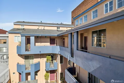a front view of a building with many windows