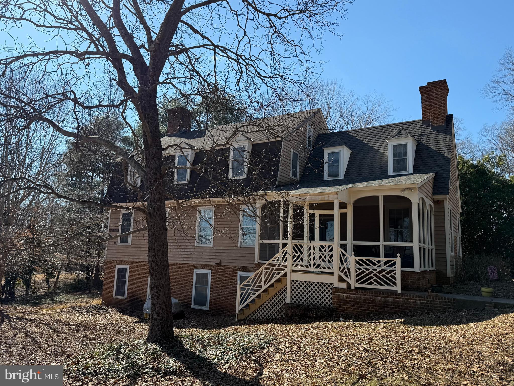 19389 Woods Road Culpeper, VA 22701 - Photo 2 of 7 a view of a house with a yard