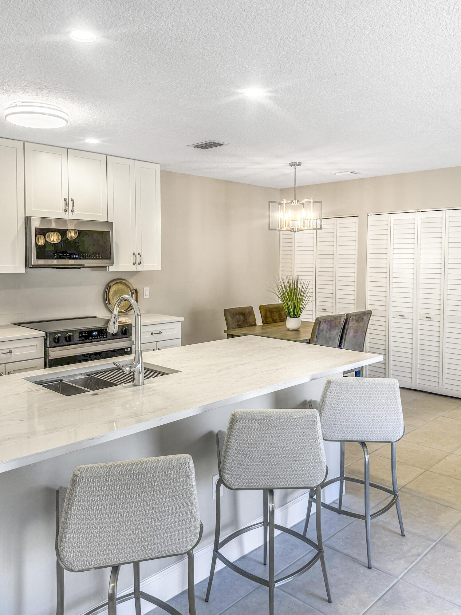 3957 Northwest Cinnamon Tree Circle Jensen Beach, FL 34957 - Photo 7 of 18 IMG_1765