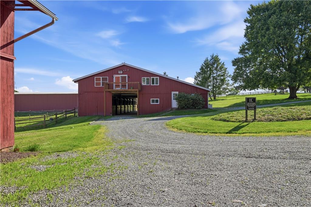 121 Brewer Road Saxonburg, PA 16056 - Photo 42 of 49 a view of a house with a yard
