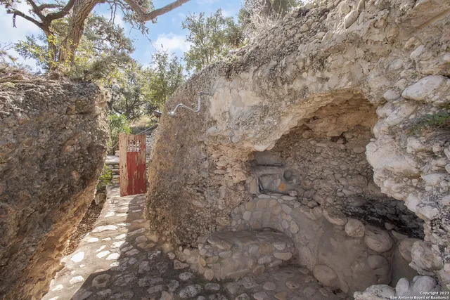 a view of a patio with a fireplace