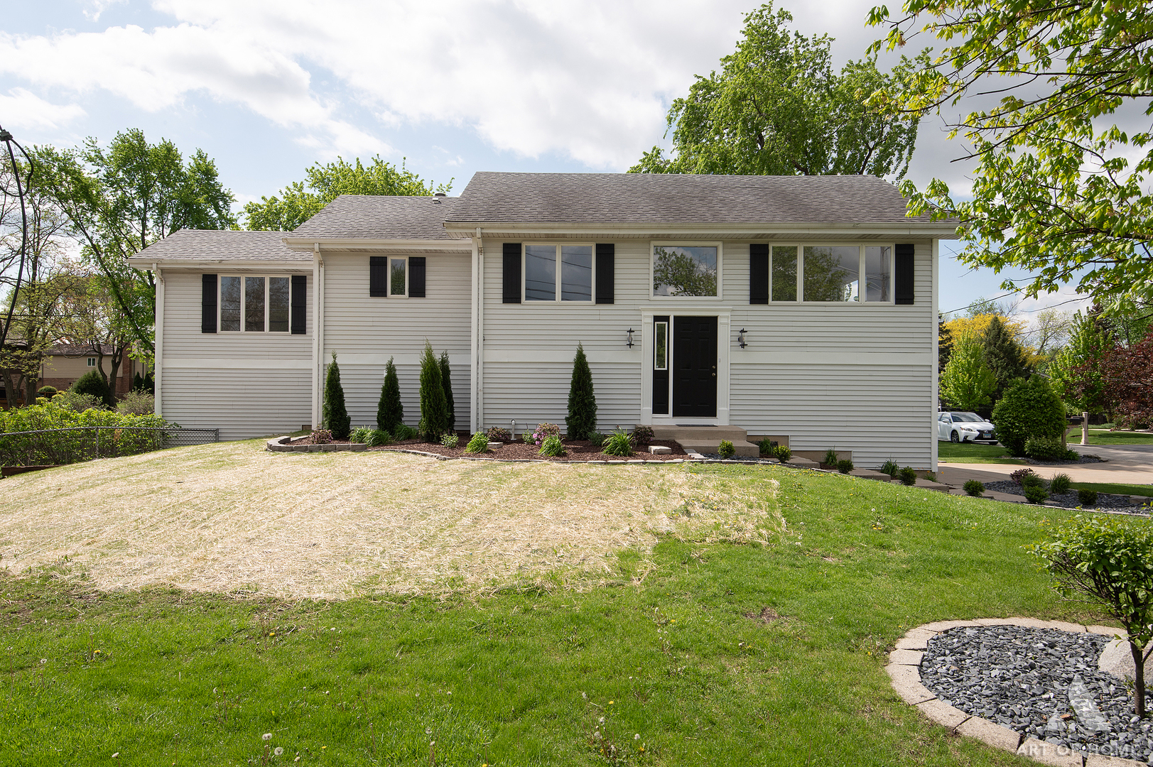 1170 McCarthy Road Lemont, IL 60439 - Photo 3 of 53 a front view of a house with a yard