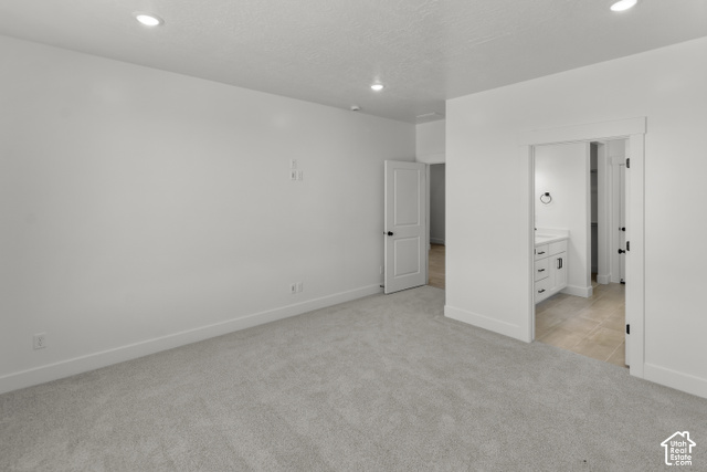 205 East 690th Street North Logan, UT 84321 - Photo 43 of 52 Bright interior with recessed lighting, plush carpet flooring, white walls, and white trim