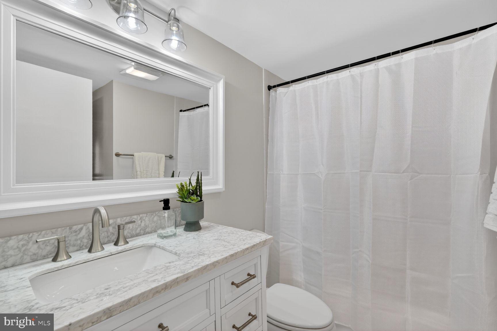 2111 Wisconsin Avenue Northwest, Unit 210 Washington, DC 20007 - Photo 16 of 23 Updated bath