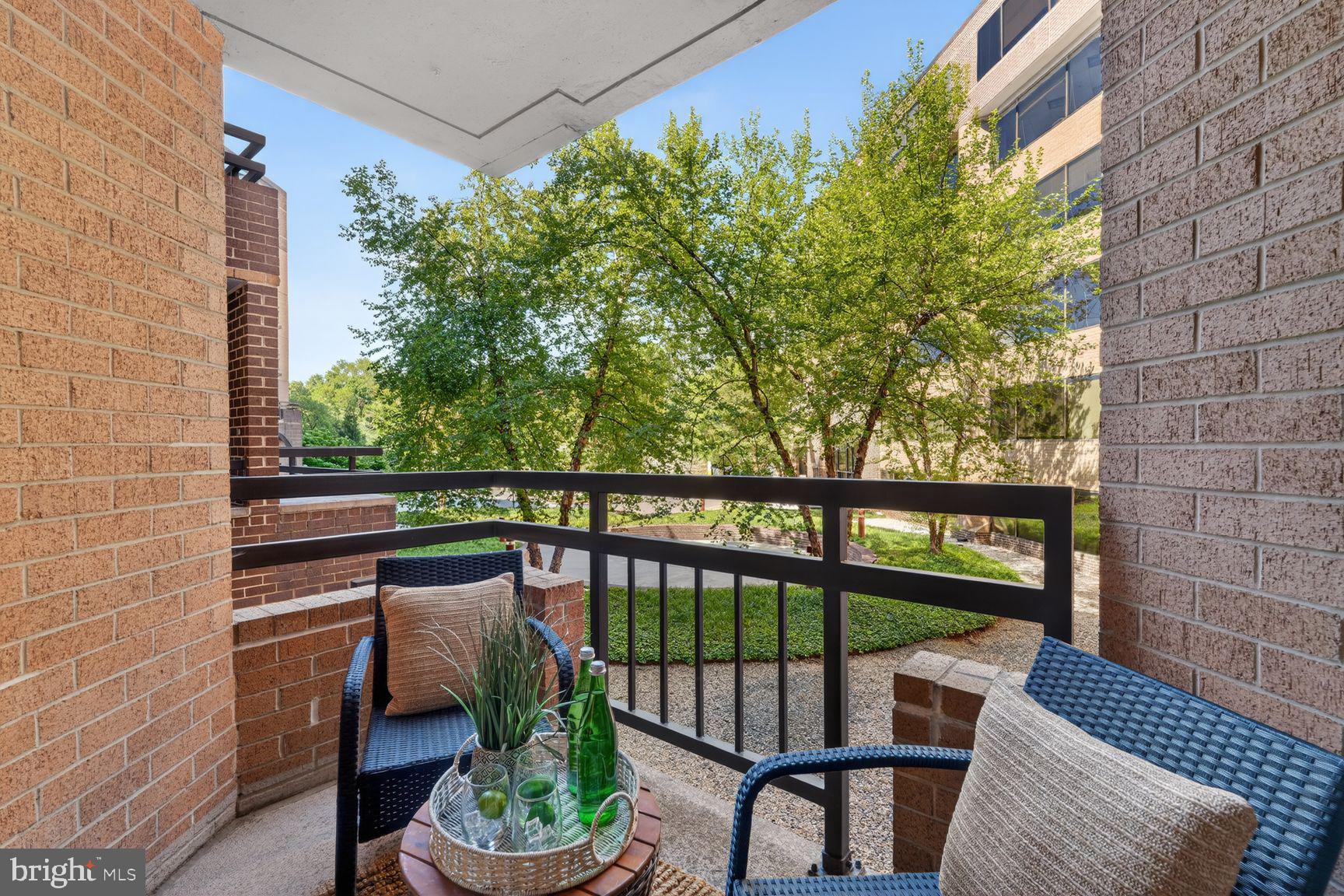 2111 Wisconsin Avenue Northwest, Unit 210 Washington, DC 20007 - Photo 7 of 23 Private balcony looking into trees