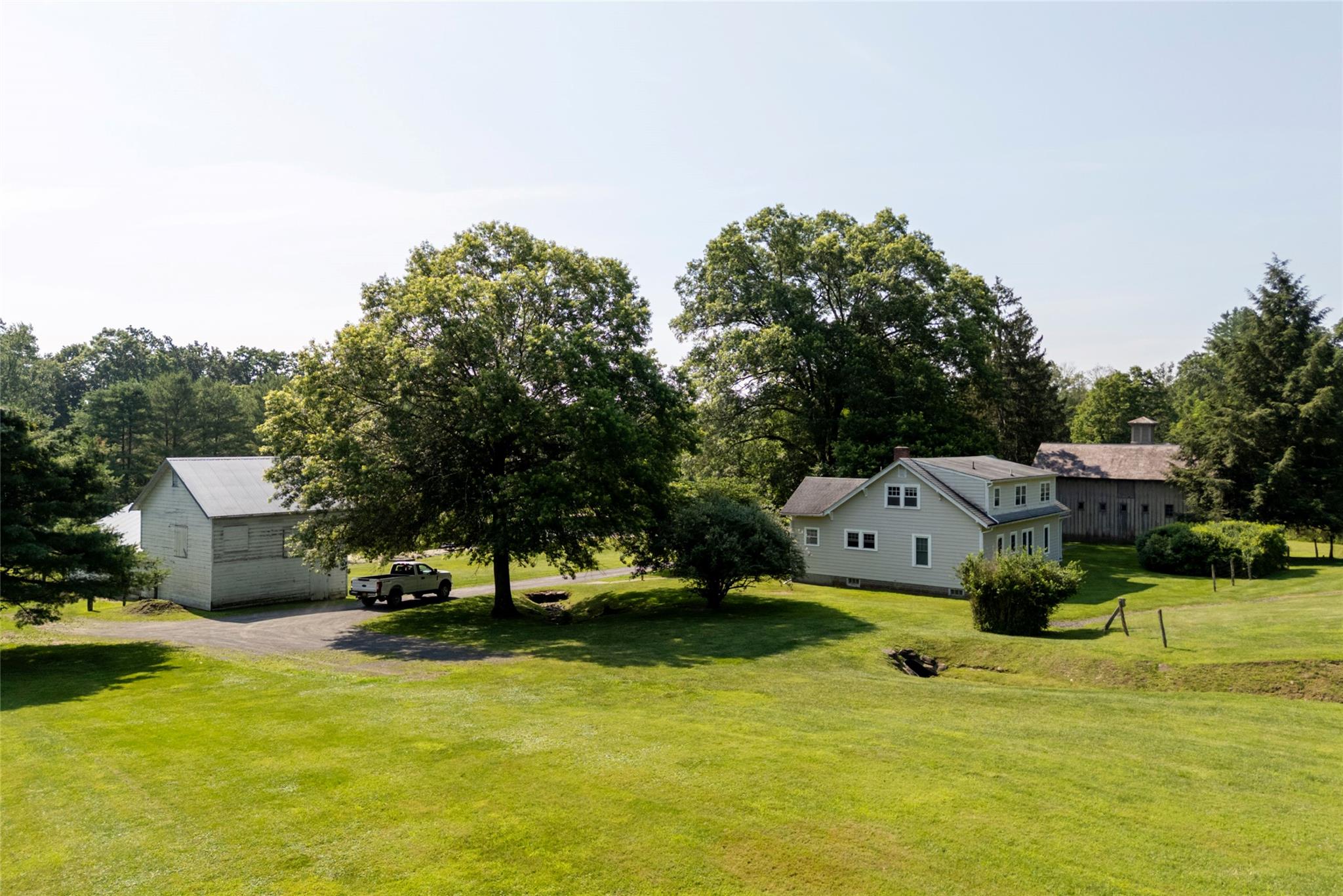 77 Old Post Road Rhinebeck, NY 12572 - Photo 1 of 1 a view of a house with yard and sitting area