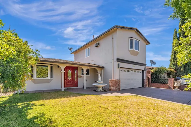 a front view of house with yard