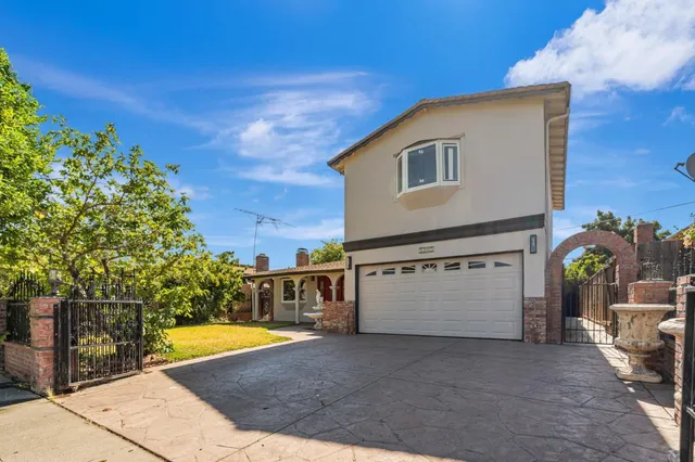 a view of a house with swimming pool