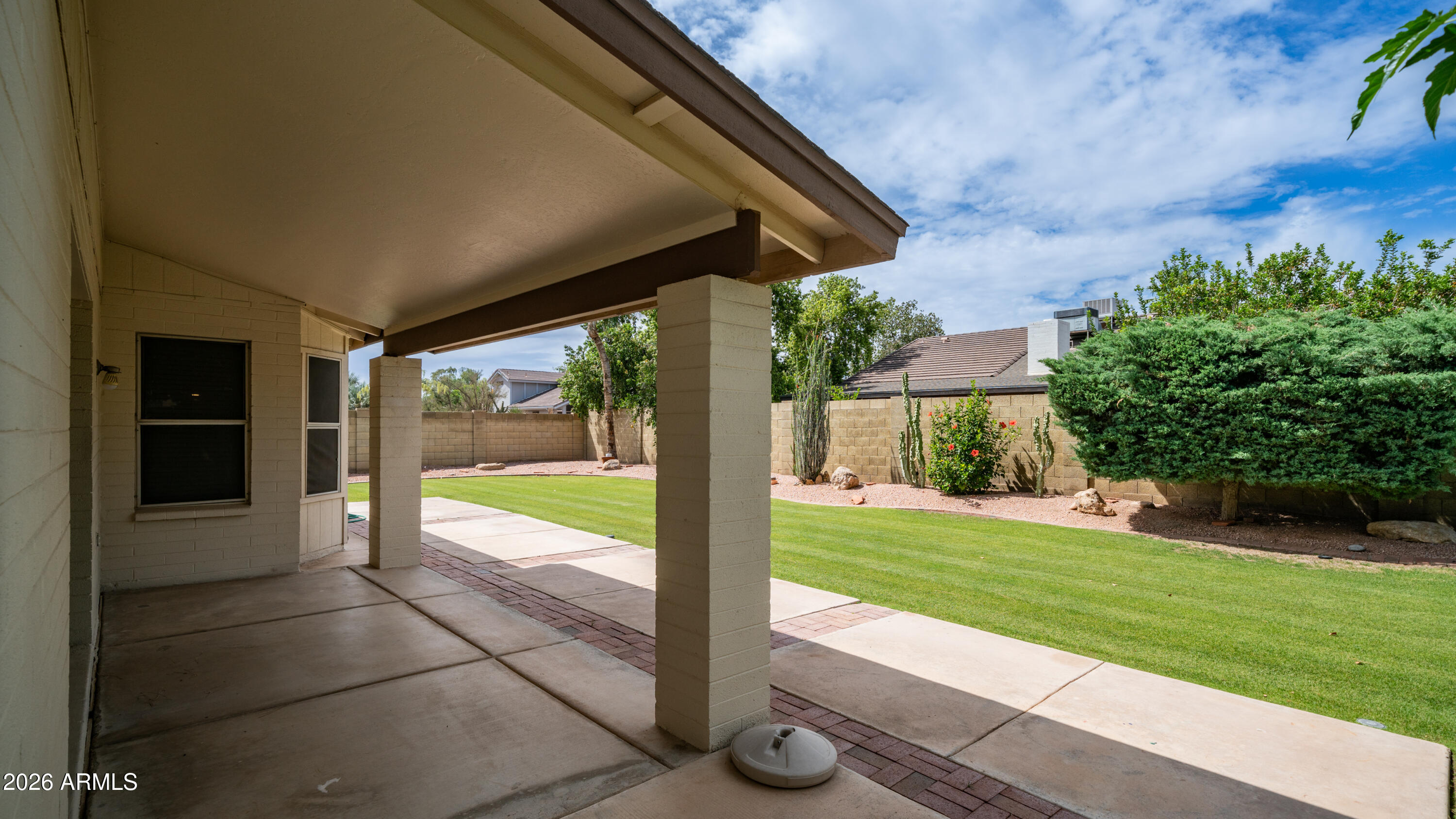 6620 West Redfield Road Glendale, AZ 85306 - Photo 15 of 33 a view of a porch with a backyard