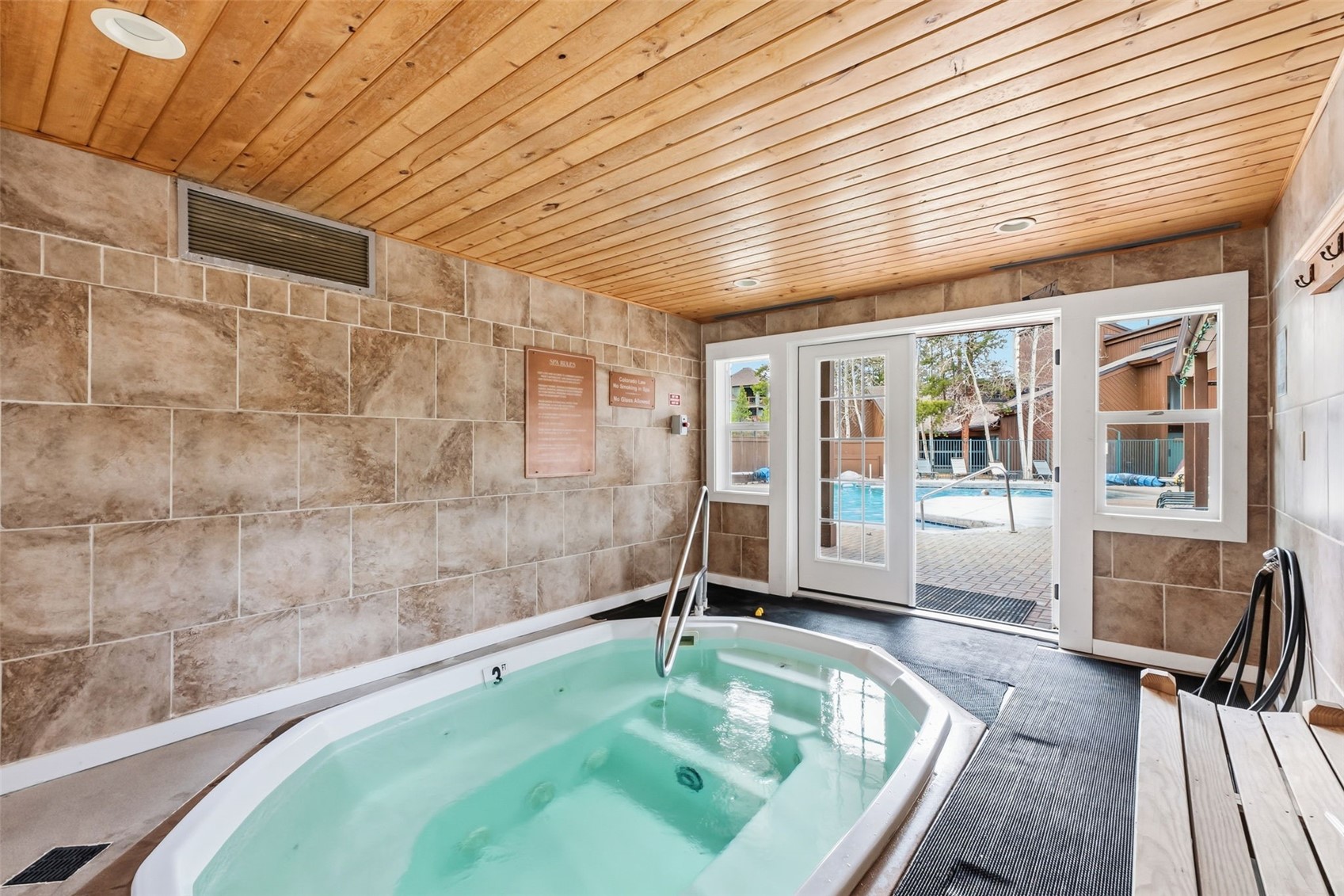 423 Wild Irishman Road, Unit 1010 Keystone, CO 80435 - Photo 22 of 22 a swimming pool with outdoor seating