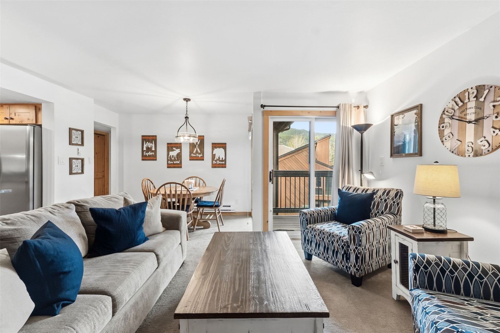 423 Wild Irishman Road, Unit 1010 Keystone, CO 80435 - Photo 7 of 22 a living room with furniture and a large window