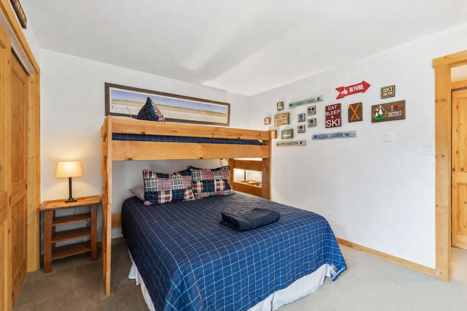 423 Wild Irishman Road, Unit 1010 Keystone, CO 80435 - Photo 9 of 22 a bedroom with a bed and a dresser
