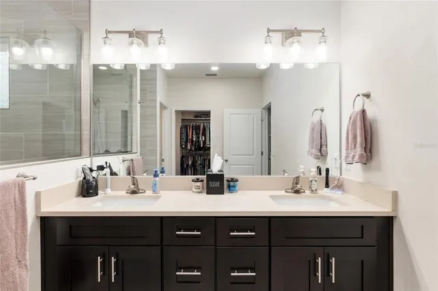 a view of a hallway with washer and dryer