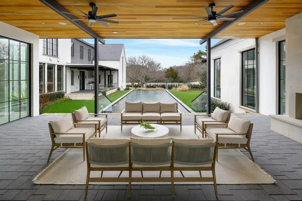 a patio with patio outdoor seating and yard