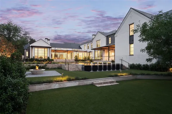 a view of swimming pool and outdoor seating