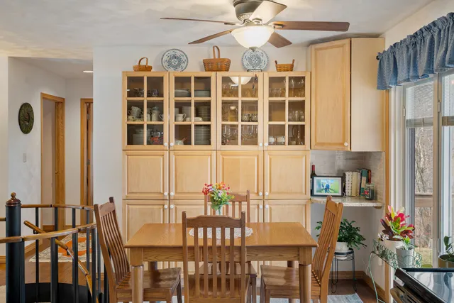an outdoor view of a house with glass windows