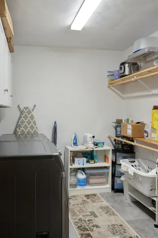 a bedroom with a bed and storage