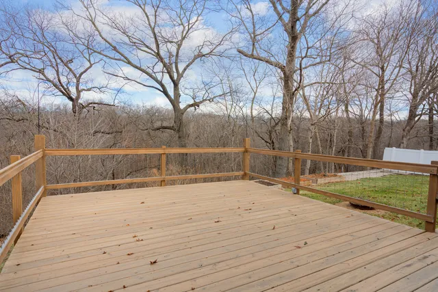 view of a house with a park