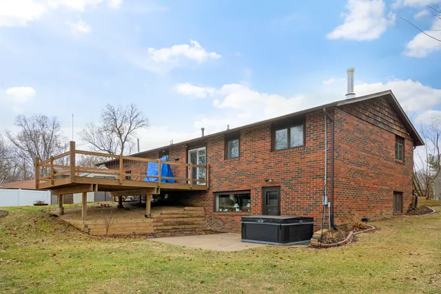 a view of swimming pool with seating area