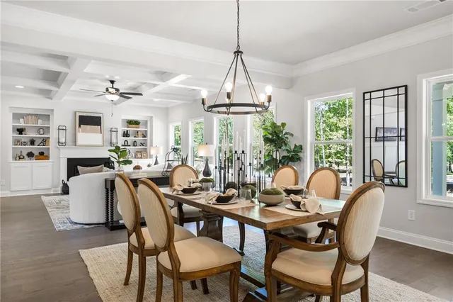 a kitchen with granite countertop a sink and a stove top oven