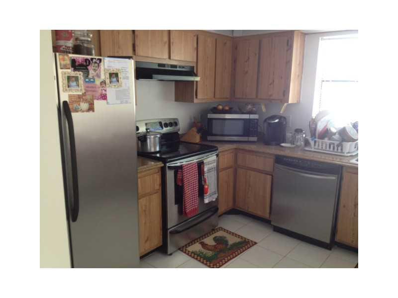 3370 Beau Rivage Drive, Unit 1R Pompano Beach, FL 33064 - Photo 5 of 13 Kitchen