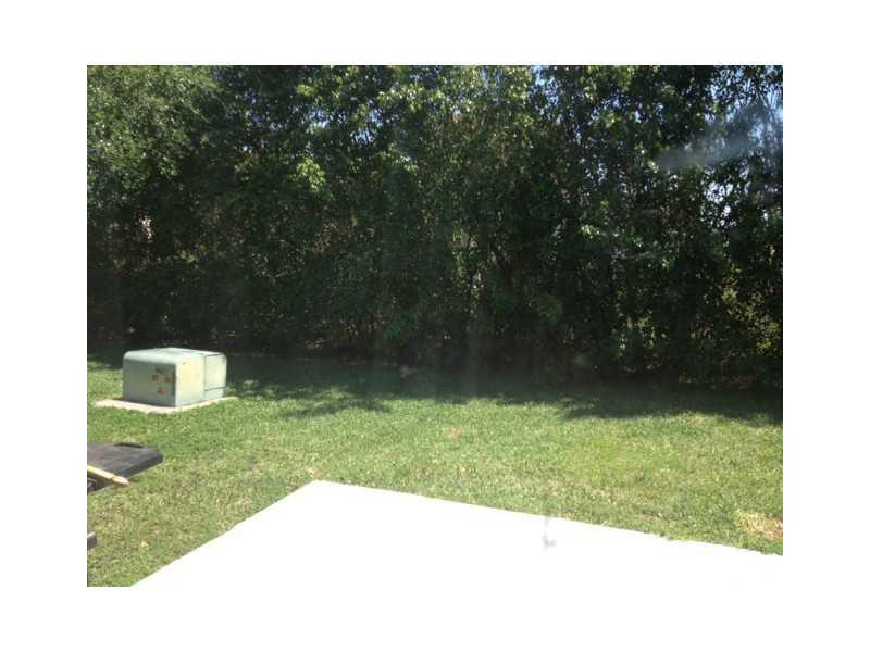 3370 Beau Rivage Drive, Unit 1R Pompano Beach, FL 33064 - Photo 9 of 13 Yard/Garden