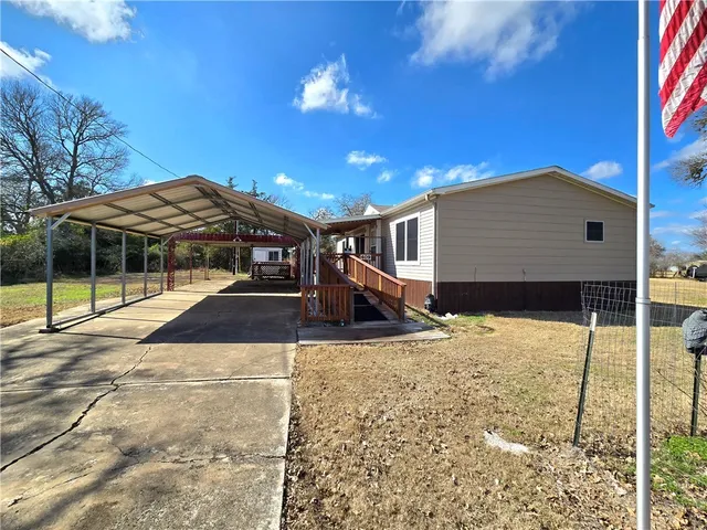 a view of a house with a snow