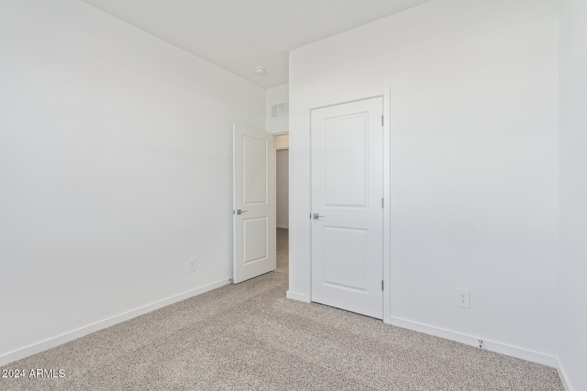 17629 West Madison Street Goodyear, AZ 85338 - Photo 22 of 46 Bedroom 2 w/ Walk-In Closet
