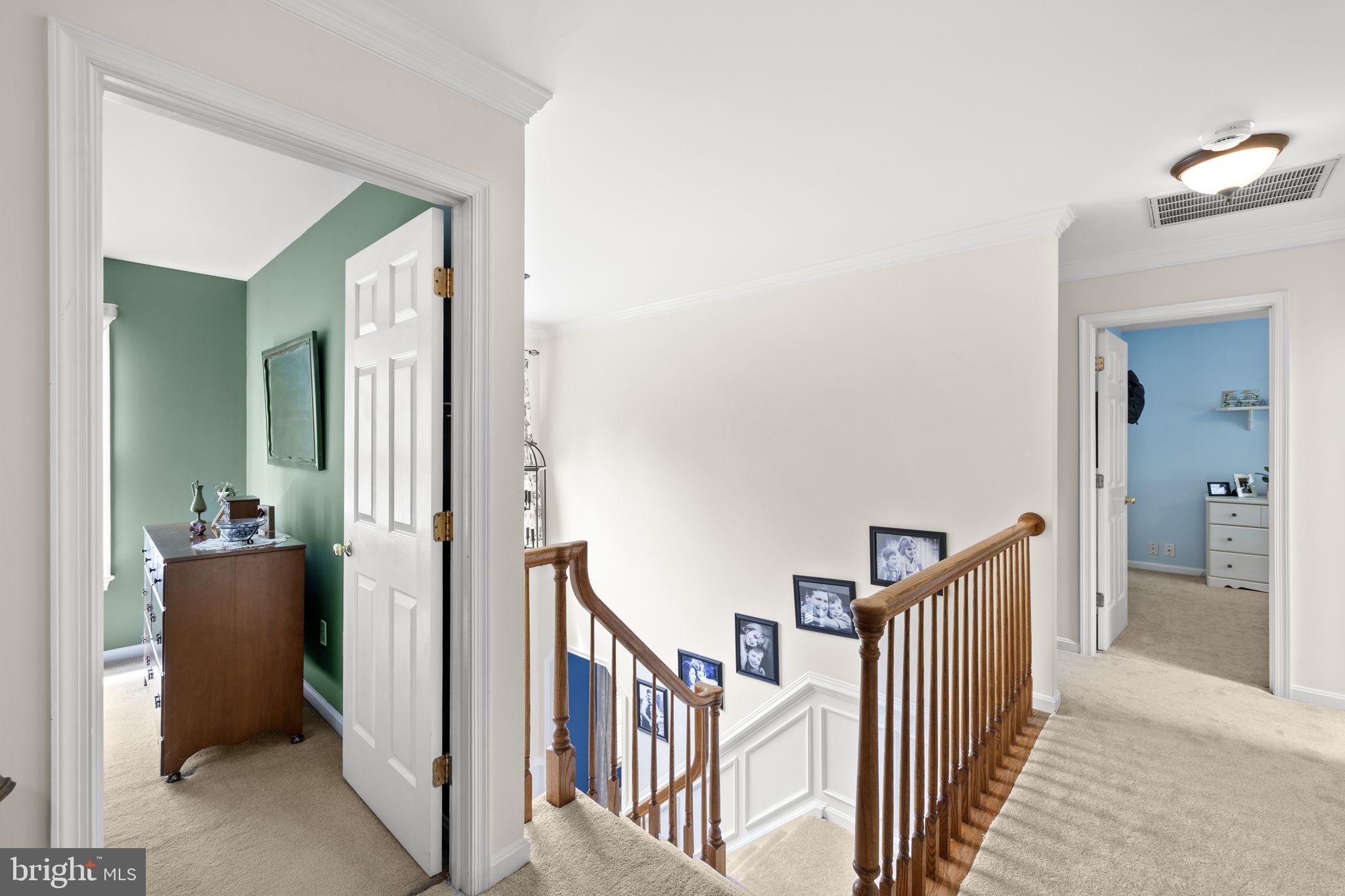 100 Boscobel Road Fredericksburg, VA 22405 - Photo 46 of 67 a view of a hallway with a livingroom and a staircase