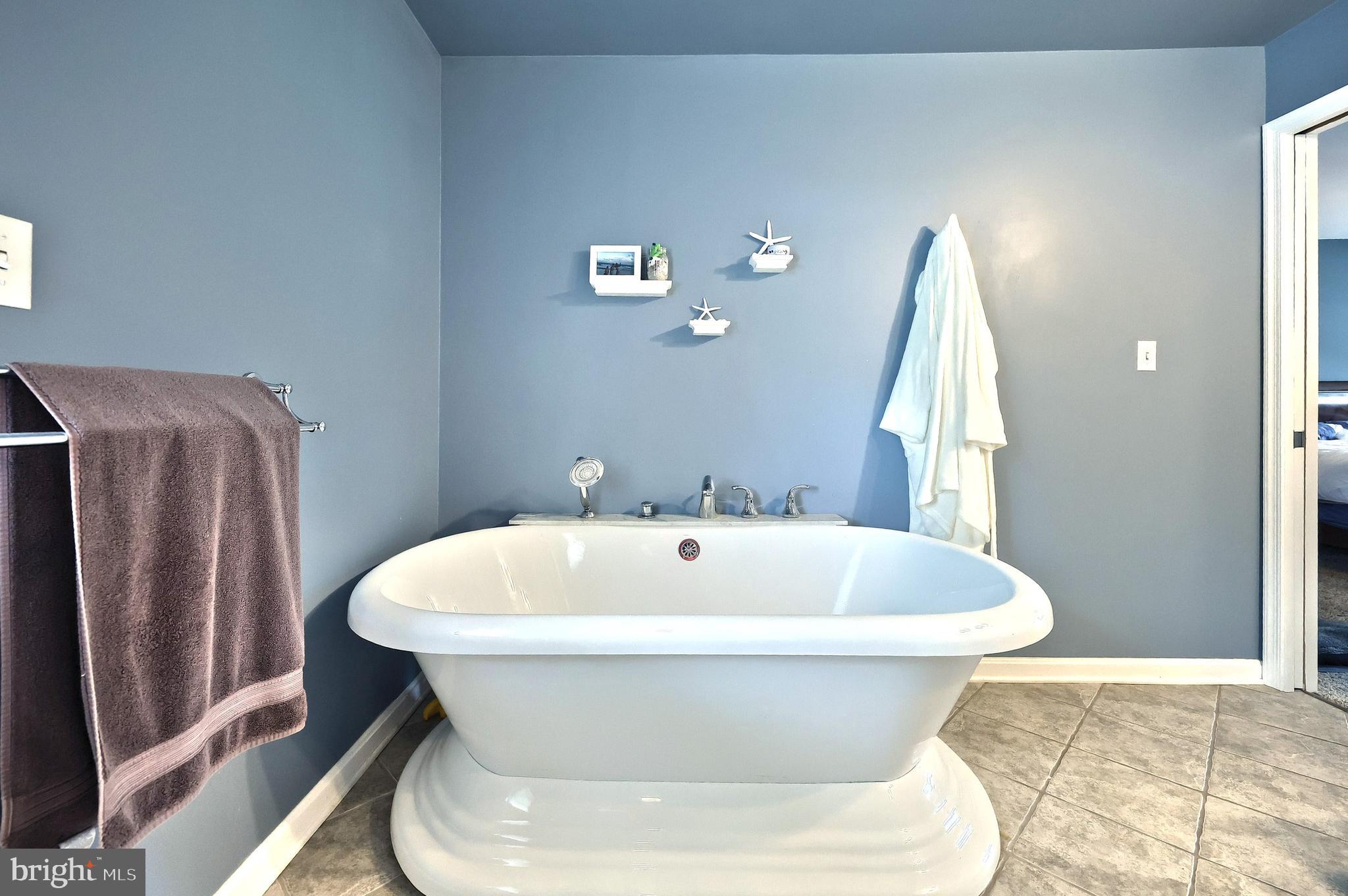 2420 Sutton Road York, PA 17403 - Photo 26 of 49 a white bath tub sitting in a bathroom