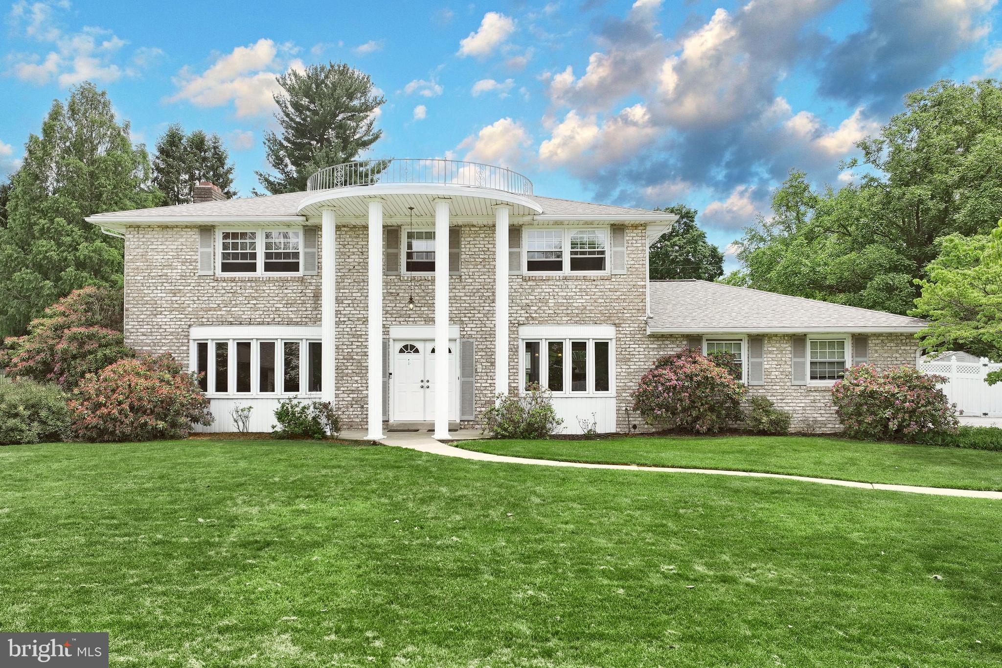 2420 Sutton Road York, PA 17403 - Photo 40 of 49 a front view of a house with a yard