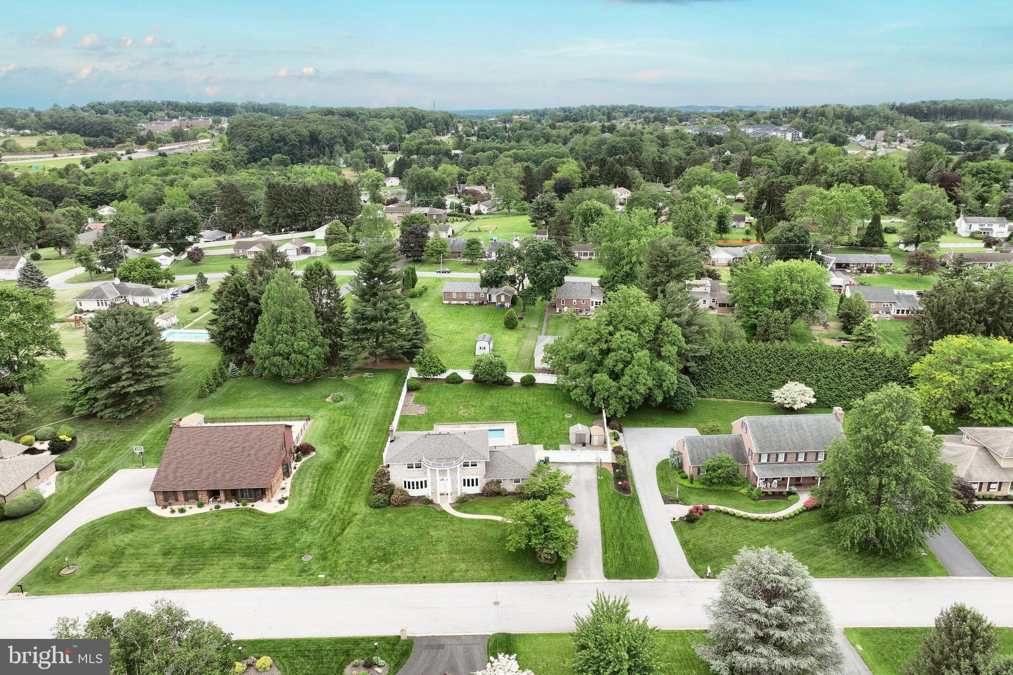 2420 Sutton Road York, PA 17403 - Photo 42 of 49 an aerial view of a house with a garden