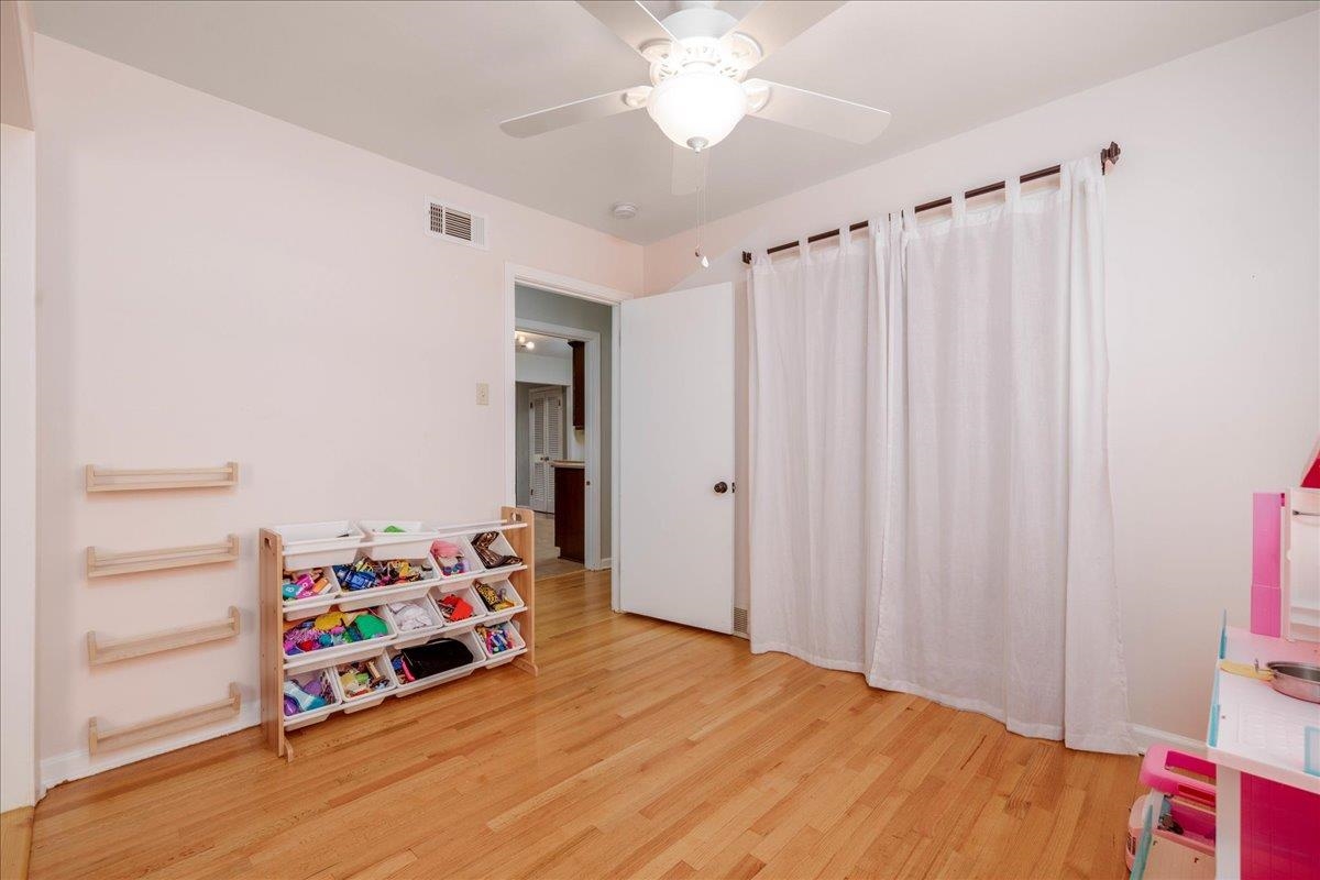 1660 Raymore Road Memphis, TN 38117 - Photo 24 of 30 Recreation room with ceiling fan and light hardwood / wood-style flooring