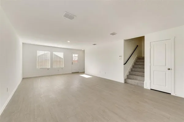 a view of kitchen and windows