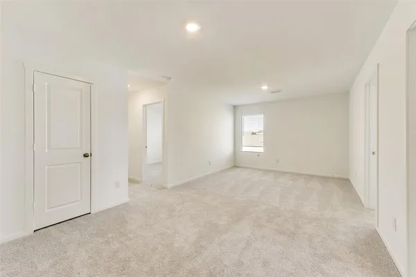 a bathroom with a shower and toilet