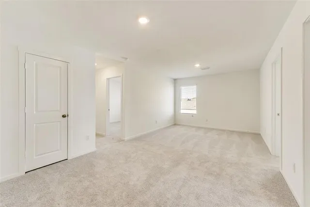 a bathroom with a shower and toilet