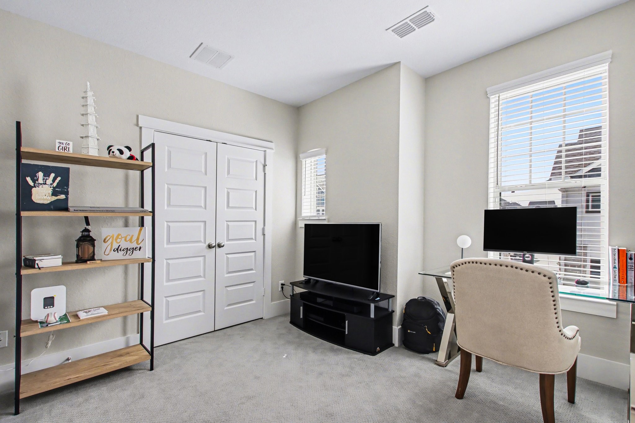 2007 Tarfite Place Houston, TX 77077 - Photo 18 of 24 a view of a livingroom with furniture and a flat screen tv