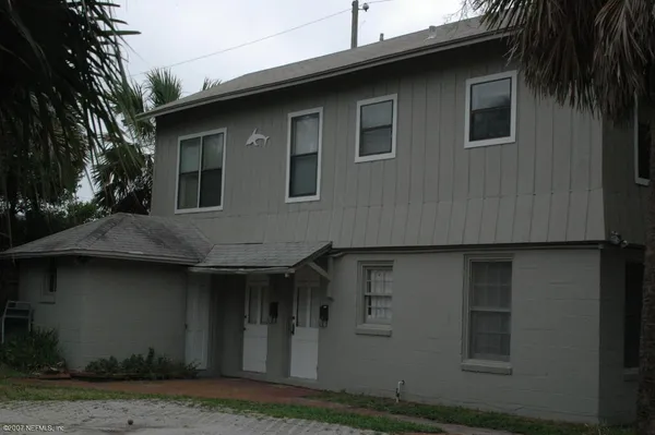 a house that has a lot of windows on it