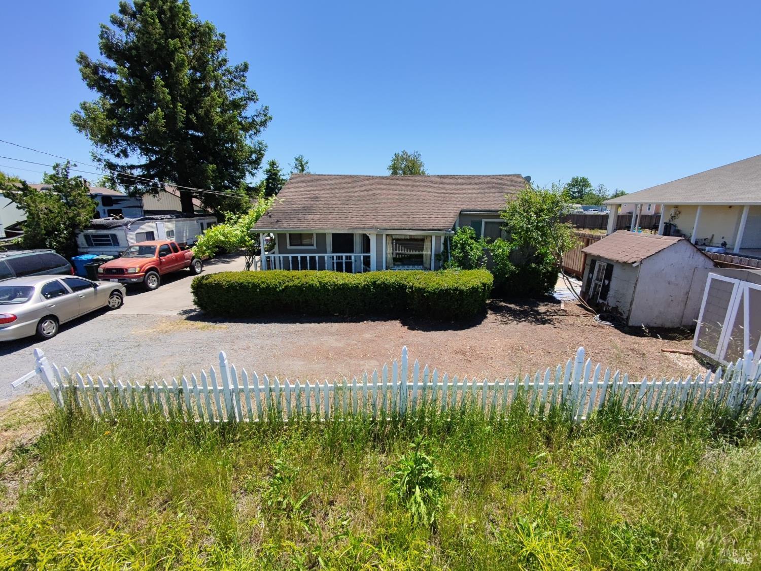 148 Millbrae Avenue Santa Rosa, CA 95407 - Photo 1 of 29 a view of a garden with a house