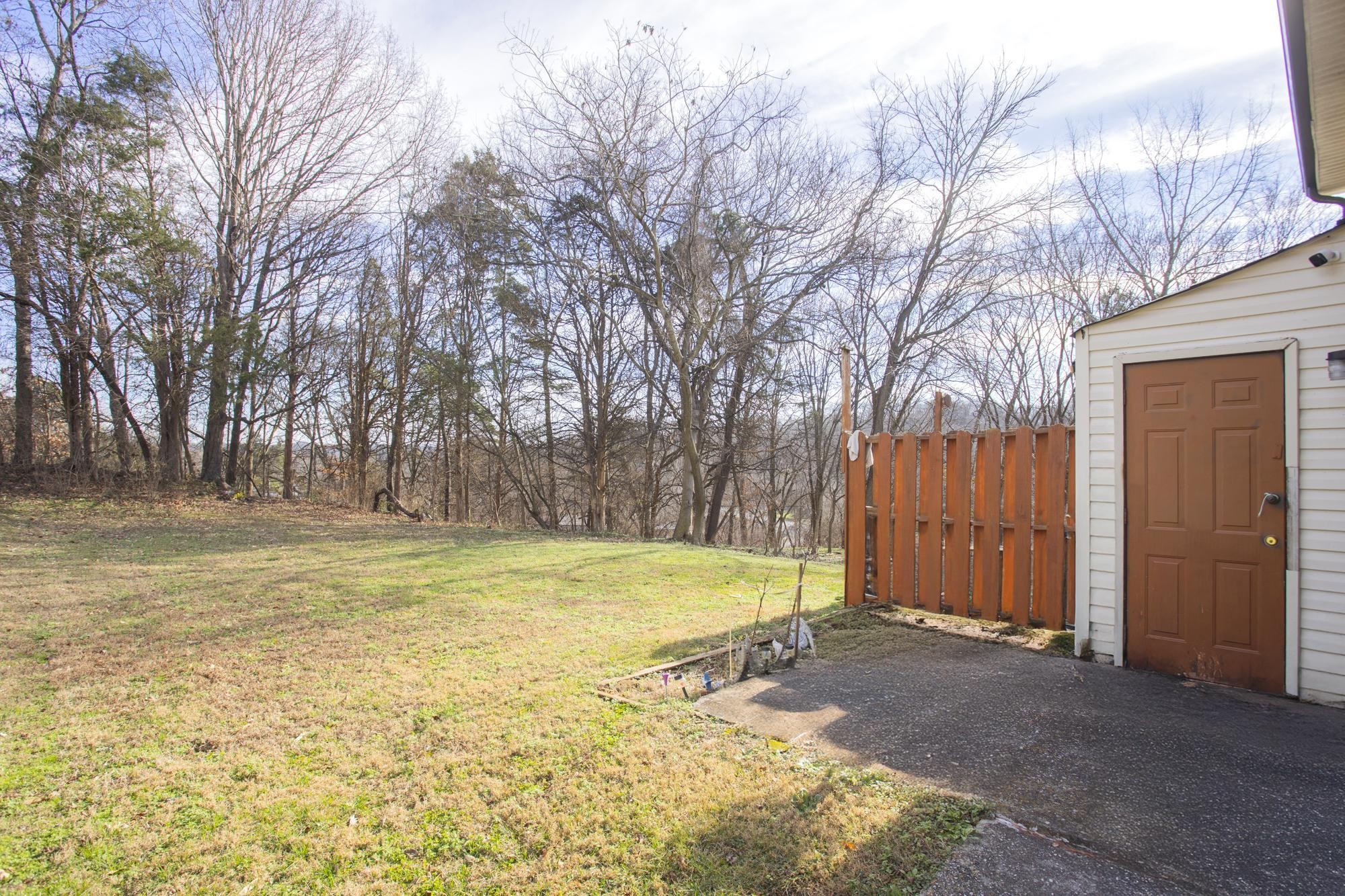 208 Leeshan Court Antioch, TN 37013 - Photo 26 of 31 a view of yard with swimming pool and tree