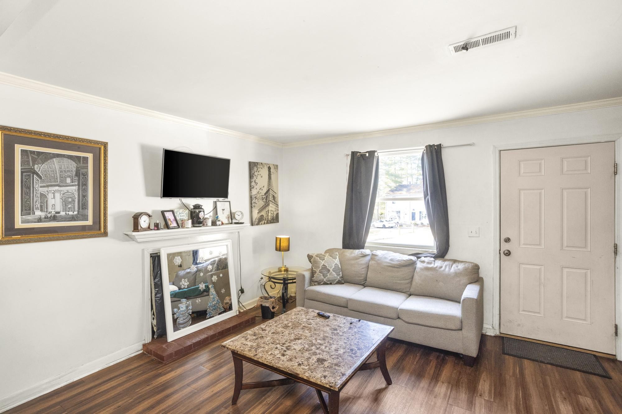 208 Leeshan Court Antioch, TN 37013 - Photo 4 of 31 a living room with furniture and a flat screen tv