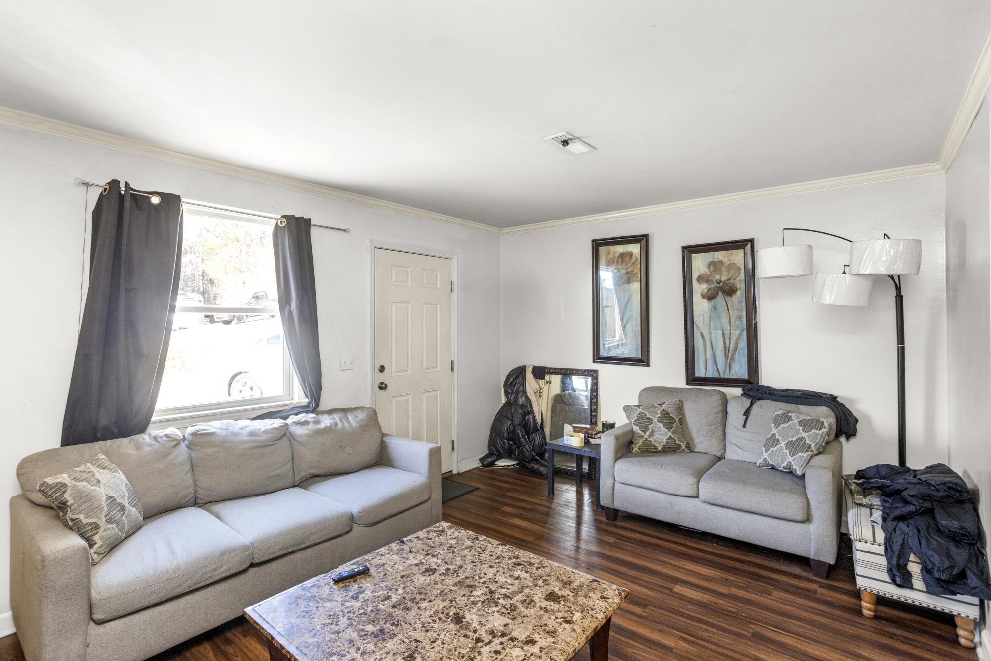 208 Leeshan Court Antioch, TN 37013 - Photo 5 of 31 a living room with furniture and a couch
